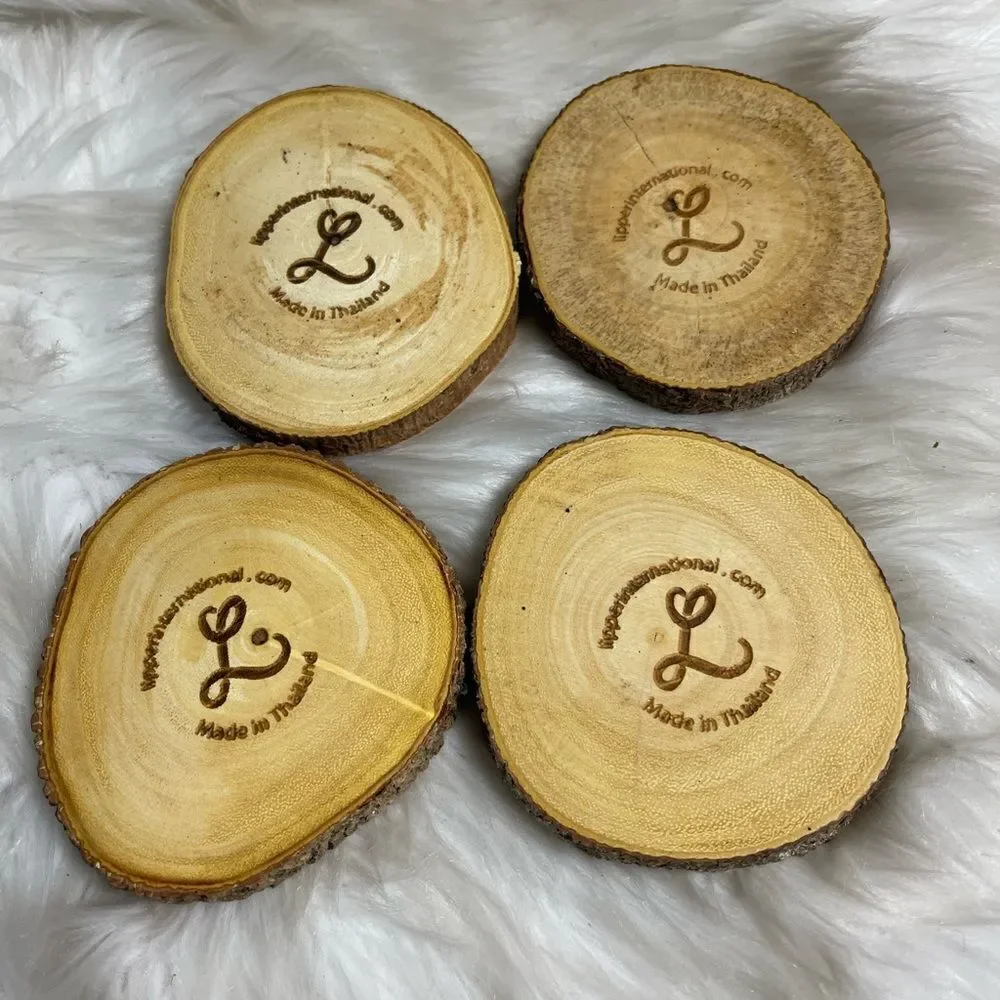 Lipper International Acacia Tree Barks set of four coasters .